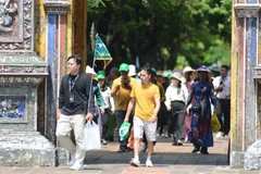 Tourists at the Hue Imperial Citadel (Photo: VNA)