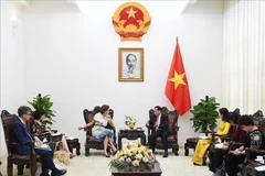 Deputy Prime Minister and Foreign Minister Bui Thanh Son (R) and UNESCO Director-General Audrey Azoulay in Hanoi (Photo: VNA)