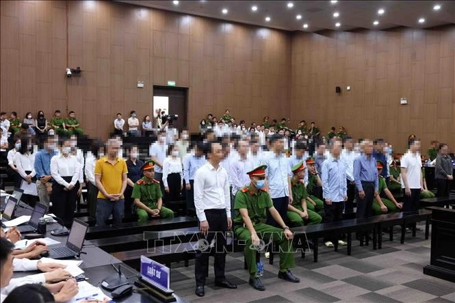 The defendants at the trial. (File photo: VNA)
