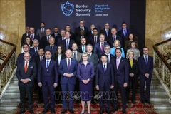 Minister of Public Security General Luong Tam Quang (second from right, first row) and other delegates at the Border Security Summit. (Photo: VNA)