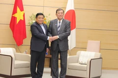 Deputy PM Nguyen Chi Dung (L) and Japanese PM Shigeru Ishiba. (Photo: VNA)