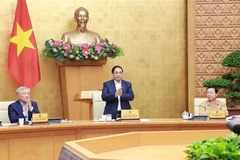 PM Pham Minh Chinh at the regular June cabinet meeting on July 3. (Photo: VNA)