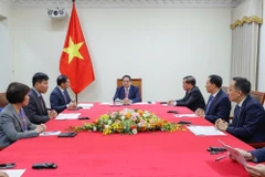 Prime Minister Pham Minh Chinh holds phone talks with his Malaysian counterpart Anwar Ibrahim on April 6. (Photo: VNA)