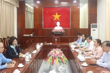 Representatives from ActionAid Vietnam and Can Tho City People's Committee at the working session to discuss orientations for the organisation's programmes and projects after the merger of Can Tho, Soc Trang, and Hau Giang. (Photo: VNA) 