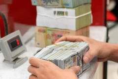 Reference exchange rate up 2 VND at week’s beginning