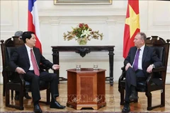 State President Luong Cuong (left) and President of the Chilean Senate José Garcia Ruminot (Photo: VNA)